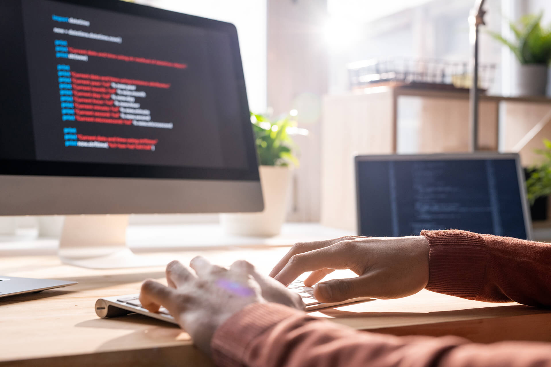 hands-of-contemporary-programmer-over-keypad-durin-9VJ4PNA.jpg